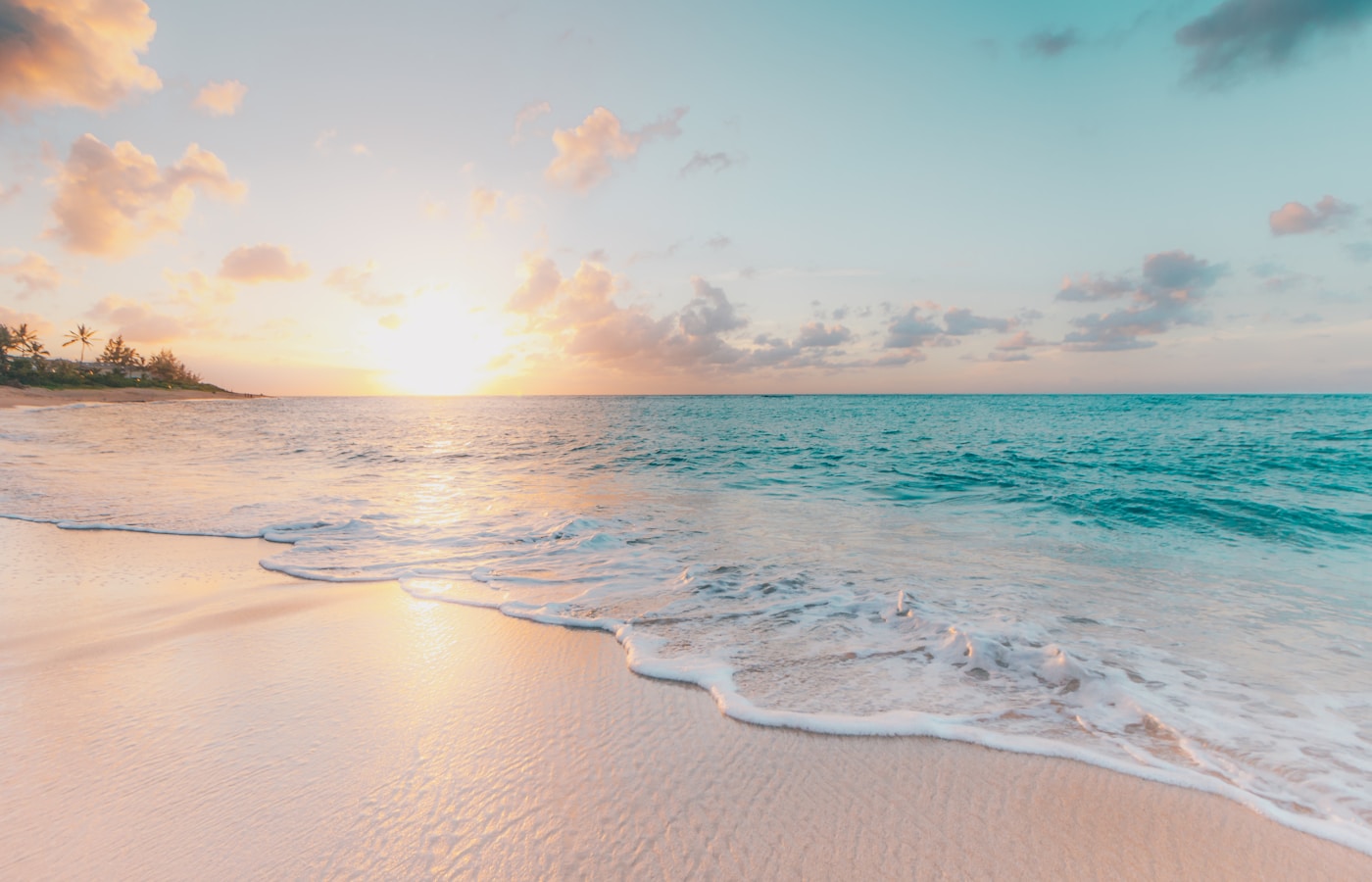 Sunset over a Spanish Mediterranean beach with gentle waves